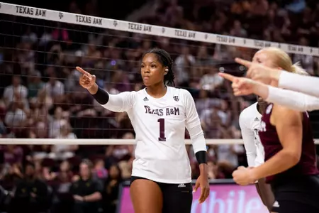 COLLEGE STATION, TX - August 19, 2023 - Middle Blocker Ifenna Cos-Okpalla #1 of the Texas A&M Aggies during the game between the Baylor Bears and the Texas A&M Aggies at Reed Arena in College Station, TX. Photo By Brendall O'Banon/Texas A&M Athletics