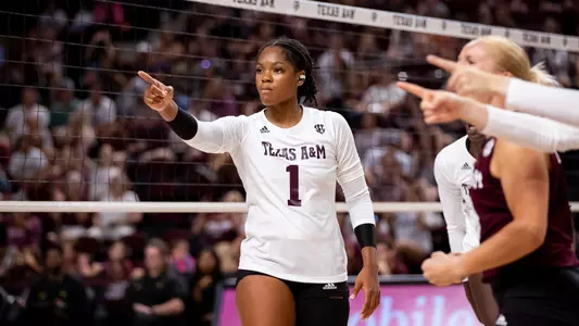COLLEGE STATION, TX - August 19, 2023 - Middle Blocker Ifenna Cos-Okpalla #1 of the Texas A&M Aggies during the game between the Baylor Bears and the Texas A&M Aggies at Reed Arena in College Station, TX. Photo By Brendall O'Banon/Texas A&M Athletics