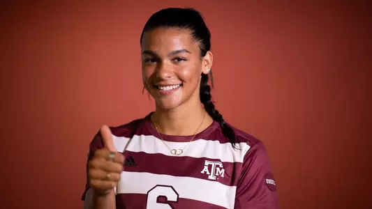 Andersen Williams shoots a Gig'em during her portrait shoot.