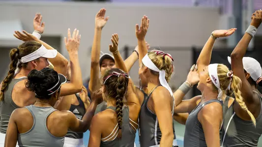 Women's tennis team huddle