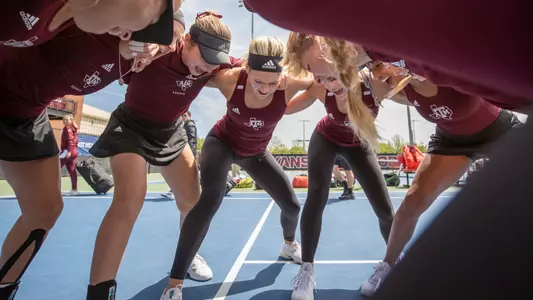 Women's tennis team huddle