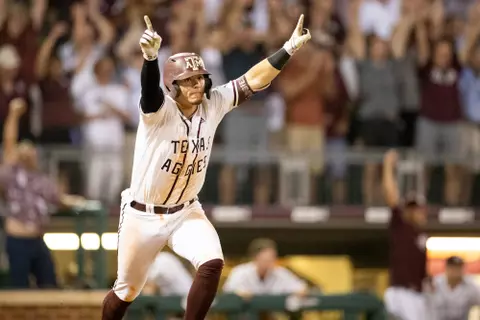 COLLEGE STATION, TX - June 10, 2022 - Catcher Troy Claunch #12 of the Texas A&M Aggies during the game between the Louisville Cardinals and the Texas A&M Aggies at Blue Bell Park in College Station, TX. Photo By Hayden Carroll/Texas A&M Athletics