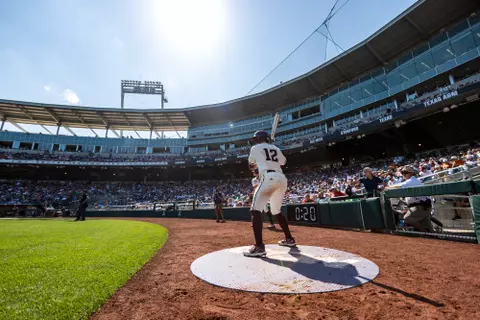 OMAHA, NE - June 19, 2022 - Catcher Troy Claunch #12 of the Texas A&M Aggies during the NCAA Baseball College World Series game between the Texas Longhorns and the Texas A&M Aggies at Charles Schwab Field in Omaha, NE. Photo By Kate Luffman/Texas A&M Athletics