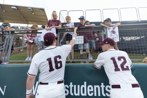 COLLEGE STATION, TX - May 14, 2023 - Infielder Ryan Targac #16 of the Texas A&M Aggies and Infielder Austin Bost #12 of the Texas A&M Aggies during the game between the Alabama Crimson Tide and the Texas A&M Aggies at Blue Bell Park in College Station, TX. Photo By Ethan Mito/Texas A&M Athletics