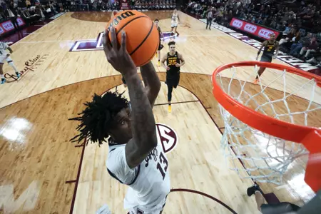 COLLEGE STATION, TX - January 23, 2024 - Forward Solomon Washington #13 of the Texas A&M Aggies during the game between the Missouri Tigers and the Texas A&M Aggies at Reed Arena in College Station, TX. Photo By Craig Bisacre/Texas A&M Athletics