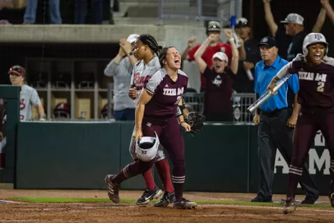 COLLEGE STATION, TX - April 23, 2022 - Infielder Trinity Cannon #26 of the Texas A&M Aggies celebrates during the Softball game between the Alabama Crimson Tide and the Texas A&M Aggies at Davis Diamond in College Station, TX. Photo By Craig Bisacre/Texas A&M Athletics