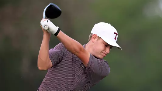 Jake Maggert gets ready to wallop a drive with his huge driver.
