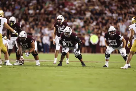 COLLEGE STATION, TX - August 31, 2024 - Offensive lineman Kolinu'u Faaiu #61 of the Texas A&M Aggies, Offensive lineman Chase Bisontis #71 of the Texas A&M Aggies and Offensive lineman Trey Zuhn III #60 of the Texas A&M Aggies during the Football game between the Notre Dame Fighting Irish and the Texas A&M Aggies at Kyle Field in College Station, TX. Photo By Craig Bisacre/Texas A&M Athletics