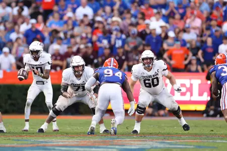 GAINESVILLE, FL - September 14, 2024 - Offensive lineman Chase Bisontis #71 of the Texas A&M Aggies and Offensive lineman Trey Zuhn III #60 of the Texas A&M Aggies during the game between the Florida Gators and the Texas A&M Aggies at Ben Hill Griffin Stadium in Gainesville, FL. Photo By Evan Pilat
