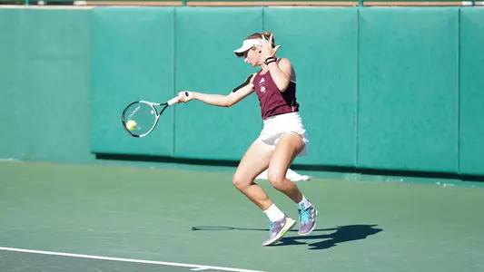 Mary Stoiana returns a serve in first round of 2024-25 NCAA Singles Championship