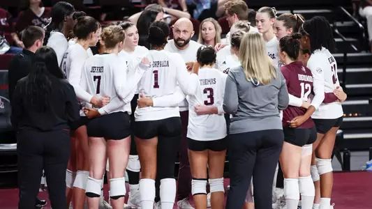 COLLEGE STATION, TX - November 03, 2024 - Head Coach Jamie Morrison of the Texas A&M Aggies and Texas A&M Aggies Volleyball Team during the game between the Mississippi St. Bulldogs and the Texas A&M Aggies at Reed Arena in College Station, TX. Photo By Rachel Mahan/Texas A&M Athletics