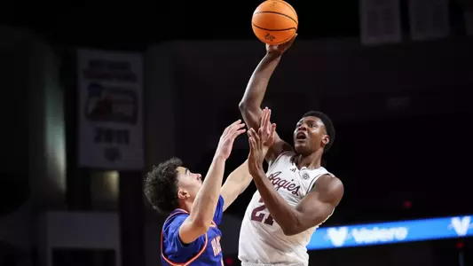 COLLEGE STATION, TX - December 20, 2024 - Forward Pharrel Payne #21 of the Texas A&M Aggies during the game between the Houston Christian Huskies and the Texas A&M Aggies at Reed Arena in College Station, TX. Photo By Ishika Samant/Texas A&M Athletics