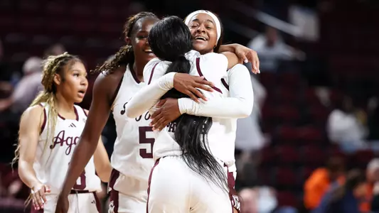 COLLEGE STATION, TX - December 04, 2024 - Guard Janae Kent #20 of the Texas A&M Aggies and Guard Taliyah Parker #21 of the Texas A&M Aggies during the game between the Syracuse Orange and the Texas A&M Aggies at Reed Arena in College Station, TX. Photo By Ethan Mito/Texas A&M Athletics
