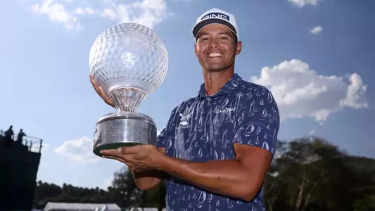 Johannes Veerman holds the trophy at the Nedbank Golf Challenge