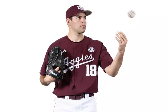 COLLEGE STATION, TX - January 11, 2024 -  Pitcher Ryan Prager #18 of the Texas A&M Aggies during Baseball Photo Day in College Station, TX. Photo By Craig Bisacre/Texas A&M Athletics