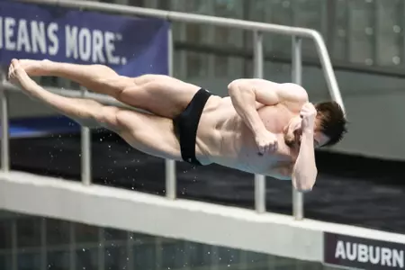 AUBURN, AL - February 19, 2024 - Victor Povzner of of the Texas A&M Aggies during the SEC Swimming and Diving Championships game at James e. Martin Aquatics Center in Auburn, AL. Photo By Ethan Mito/Texas A&M Athletics