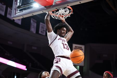 COLLEGE STATION, TX - February 20, 2024 - Forward Solomon Washington #13 of the Texas A&M Aggies during the game between the Arkansas Razorbacks and the Texas A&M Aggies at Reed Arena in College Station, TX. Photo By Craig Bisacre/Texas A&M Athletics

