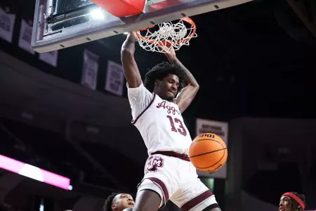 COLLEGE STATION, TX - February 20, 2024 - Forward Solomon Washington #13 of the Texas A&M Aggies during the game between the Arkansas Razorbacks and the Texas A&M Aggies at Reed Arena in College Station, TX. Photo By Craig Bisacre/Texas A&M Athletics