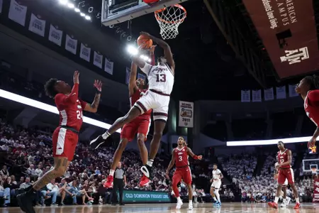 COLLEGE STATION, TX - February 20, 2024 - Forward Solomon Washington #13 of the Texas A&M Aggies during the game between the Arkansas Razorbacks and the Texas A&M Aggies at Reed Arena in College Station, TX. Photo By Craig Bisacre/Texas A&M Athletics