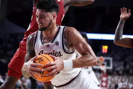 COLLEGE STATION, TX - February 20, 2024 - Guard Jace Carter #0 of the Texas A&M Aggies during the game between the Arkansas Razorbacks and the Texas A&M Aggies at Reed Arena in College Station, TX. Photo By Craig Bisacre/Texas A&M Athletics