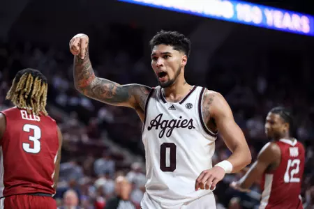 COLLEGE STATION, TX - February 20, 2024 - Guard Jace Carter #0 of the Texas A&M Aggies during the game between the Arkansas Razorbacks and the Texas A&M Aggies at Reed Arena in College Station, TX. Photo By Craig Bisacre/Texas A&M Athletics