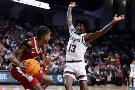 COLLEGE STATION, TX - February 20, 2024 - Forward Solomon Washington #13 of the Texas A&M Aggies during the game between the Arkansas Razorbacks and the Texas A&M Aggies at Reed Arena in College Station, TX. Photo By Craig Bisacre/Texas A&M Athletics