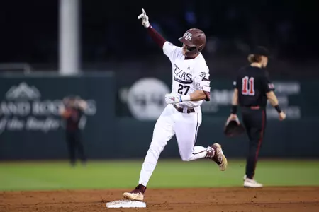 COLLEGE STATION, TX - February 27, 2024 - Infielder Ted Burton #27 of the Texas A&M Aggies during the game between the Lamar Cardinals and the Texas A&M Aggies at Blue Bell Park in College Station, TX. Photo By Wesley Bowers/Texas A&M Athletics