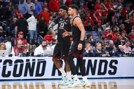 MEMPHIS, TN - March 22, 2024 - Forward Solomon Washington #13 of the Texas A&M Aggies and Guard Jace Carter #0 of the Texas A&M Aggies during the First Round of the MenÕs NCAA Tournament game between the Nebraska Cornhuskers and the Texas A&M Aggies at FedEx Forum in Memphis, TN. TX. Photo By Craig Bisacre/Texas A&M Athletics