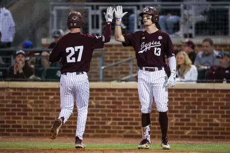 COLLEGE STATION, TX - March 26, 2024 - Infielder Ted Burton #27 of the Texas A&M Aggies and Outfielder Caden Sorrell #13 of the Texas A&M Aggies during the game between the Houston Christian Huskies and the Texas A&M Aggies at Blue Bell Park in College Station, TX. Photo By Julianne Shivers/Texas A&M Athletics