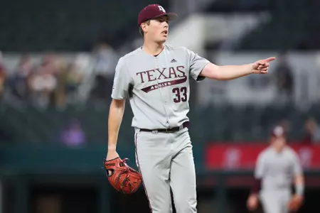 ARLINGTON, TX - March 03, 2024 - Pitcher Justin Lamkin #33 of the Texas A&M Aggies during the game between the Arizona State Sun Devils and the Texas A&M Aggies at Globe Life Field in Arlington, TX. Photo By Wesley Bowers/Texas A&M Athletics
