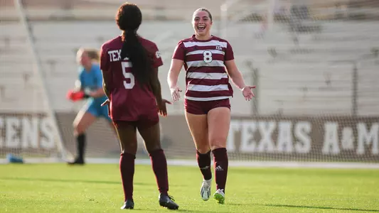 Shae O'Rourke celebrates a goal against Houston in the exhibition match.