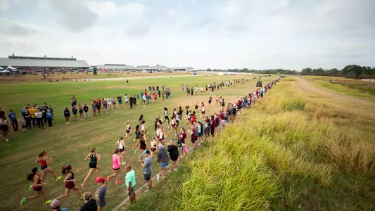 COLLEGE STATION, TX - September 15, 2023 - The Texas A&M Aggies Cross Country Team during The Texas A&M Invitational at Watts Cross Country Course in College Station, TX. Photo By Jonathan Taffet/Texas A&M Athletics