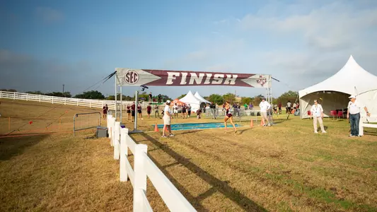 COLLEGE STATION, TX - September 15, 2023 - Maddie Livingston of the Texas A&M Aggies during The Texas A&M Invitational at Watts Cross Country Course in College Station, TX. Photo By Jonathan Taffet/Texas A&M Athletics