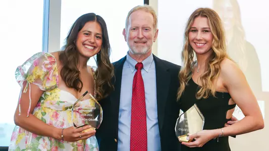 Chloe Stepanek and Miranda Grana named team MVP at the swimming & diving banquet