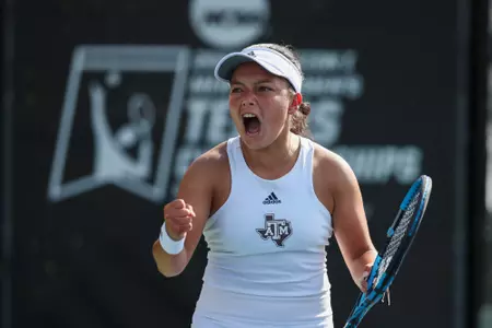 STILLWATER, OK - May 17, 2024 - Lucciana Perez of the Texas A&M Aggies during the NCAA Elite 8 game between the Virginia Cavaliers and the Texas A&M Aggies at Greenwood Tennis Center in Stillwater, Oklahoma. Photo By Ishika Samant