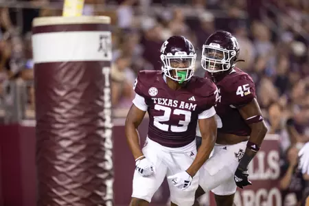 COLLEGE STATION, TX - September 02, 2023 - Linebacker Edgerrin Cooper #45 of the Texas A&M Aggies and Linebacker Chantz Johnson #23 of the Texas A&M Aggies during the Football game between the New Mexico Lobos and the Texas A&M Aggies at Kyle Field in College Station, TX. Photo By Craig Bisacre/Texas A&M Athletics