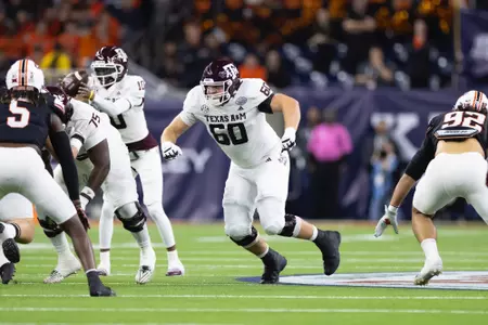 HOUSTON, TX - December 27, 2023 - Offensive lineman Trey Zuhn III #60 of the Texas A&M Aggies during the Texas Bowl Game game between the Oklahoma St. Cowboys and the Texas A&M Aggies at NRG Stadium in Houston, Texas. Photo By Evan Pilat