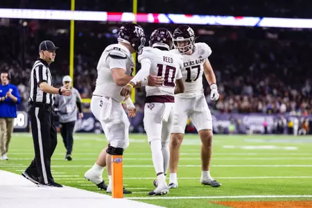 HOUSTON, TX - December 27, 2023 -  Offensive lineman Bryce Foster #61 of the Texas A&M Aggies, Quarterback Marcel Reed #10 of the Texas A&M Aggies and Tight end Theo Melin Öhrstrom #17 of the Texas A&M Aggies during the Texas Bowl Game between the Oklahoma State Cowboys and the Texas A&M Aggies at NRG Stadium in Houston, TX. Photo By Craig Bisacre/Texas A&M Athletics