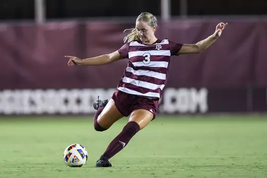 Bella James fixes to unleash a right-footed boot from the back line against Rice