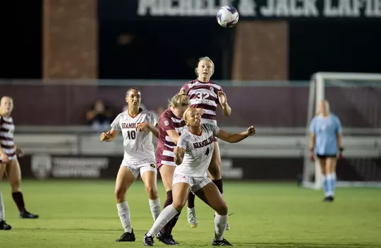Ella Goodwin goes airborne for a header against Grambling