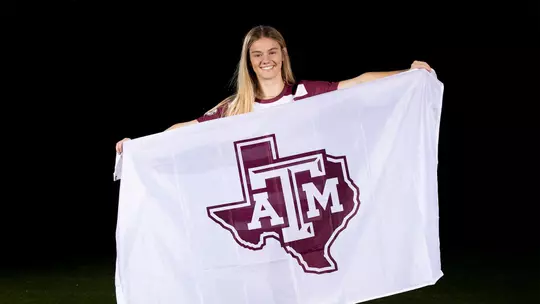 Kennedy Clark poses with his Texas A&M flag