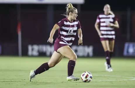 Kennedy Clark is on a full sprint into through the midfield.