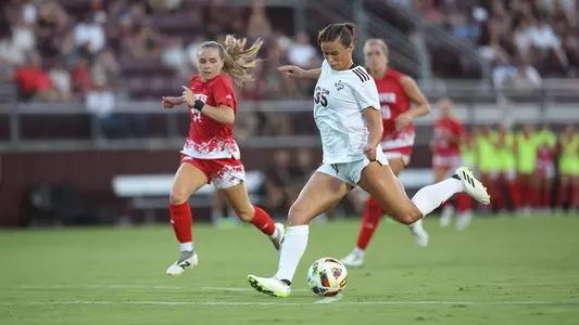 Allison Lowrey prepares to rip a left-footed shot from the top of the box.