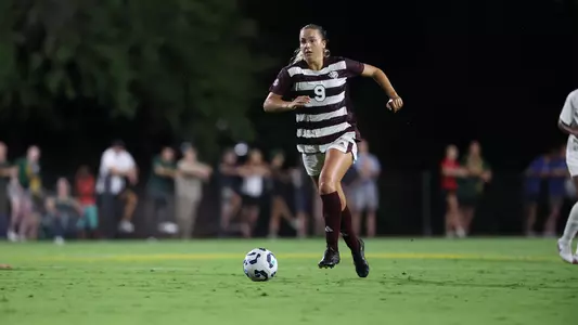 Taylor Pounds ranges the midfield against Baylor
