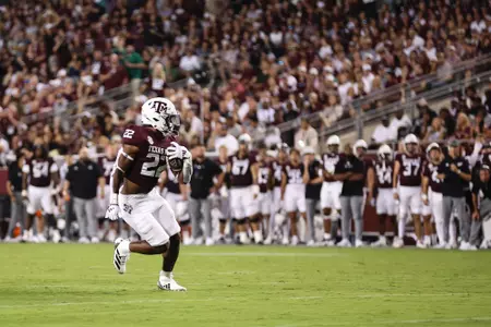 COLLEGE STATION, TX - August 31, 2024 - Running back EJ Smith #22 of the Texas A&M Aggies during the Football game between the Notre Dame Fighting Irish and the Texas A&M Aggies at Kyle Field in College Station, TX. Photo By Craig Bisacre/Texas A&M Athletics