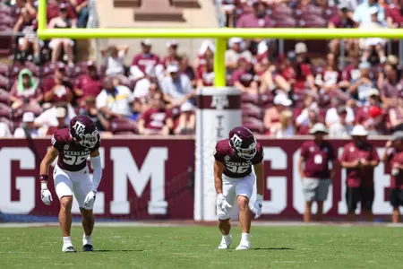 COLLEGE STATION, TX - September 07, 2024 - Defensive back Adam Graham #39 of the Texas A&M Aggies and Defensive back Layne Gerke #26 of the Texas A&M Aggies during the game between the McNeese St. Cowboys and the Texas A&M Aggies at Kyle Field in College Station, TX. Photo By Wesley Bowers/Texas A&M Athletics