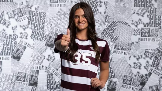 Allison Lowrey fires off a Gig'em in her content day portrait shoot