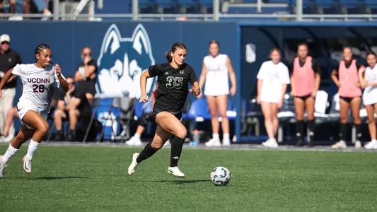 Allison Lowrey on a breakaway at UConn