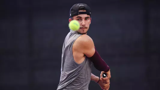 COLLEGE STATION, TX - May 03, 2024 - Luke Casper of the Texas A&M Aggies during the game between the Rice Owls and the Texas A&M Aggies at Mitchell Tennis Center in College Station, TX. Photo By Ishika Samant/Texas A&M Athletics