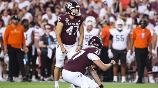 Randy Bond waiting to kick a field goal against Bowling Green